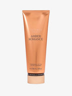 Victoria's Secret Amber Romance lotion tube on a white background