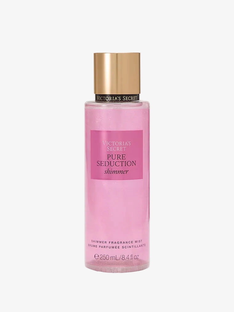 Pink bottle of Victoria's Secret Pure Seduction Shimmer fragrance mist on a white background